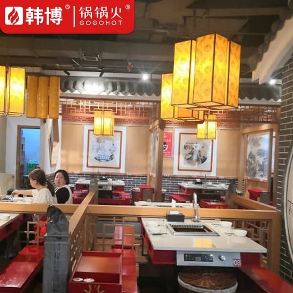 西安大龙燚火锅(亿象城店)无烟火锅桌案例(图5)