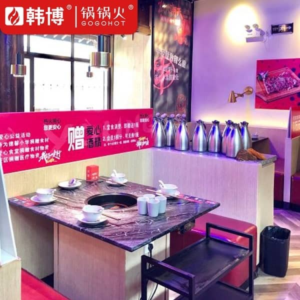 昆明热火朝天麻辣小嫩牛(南强街店)无烟火锅桌案例(图4)